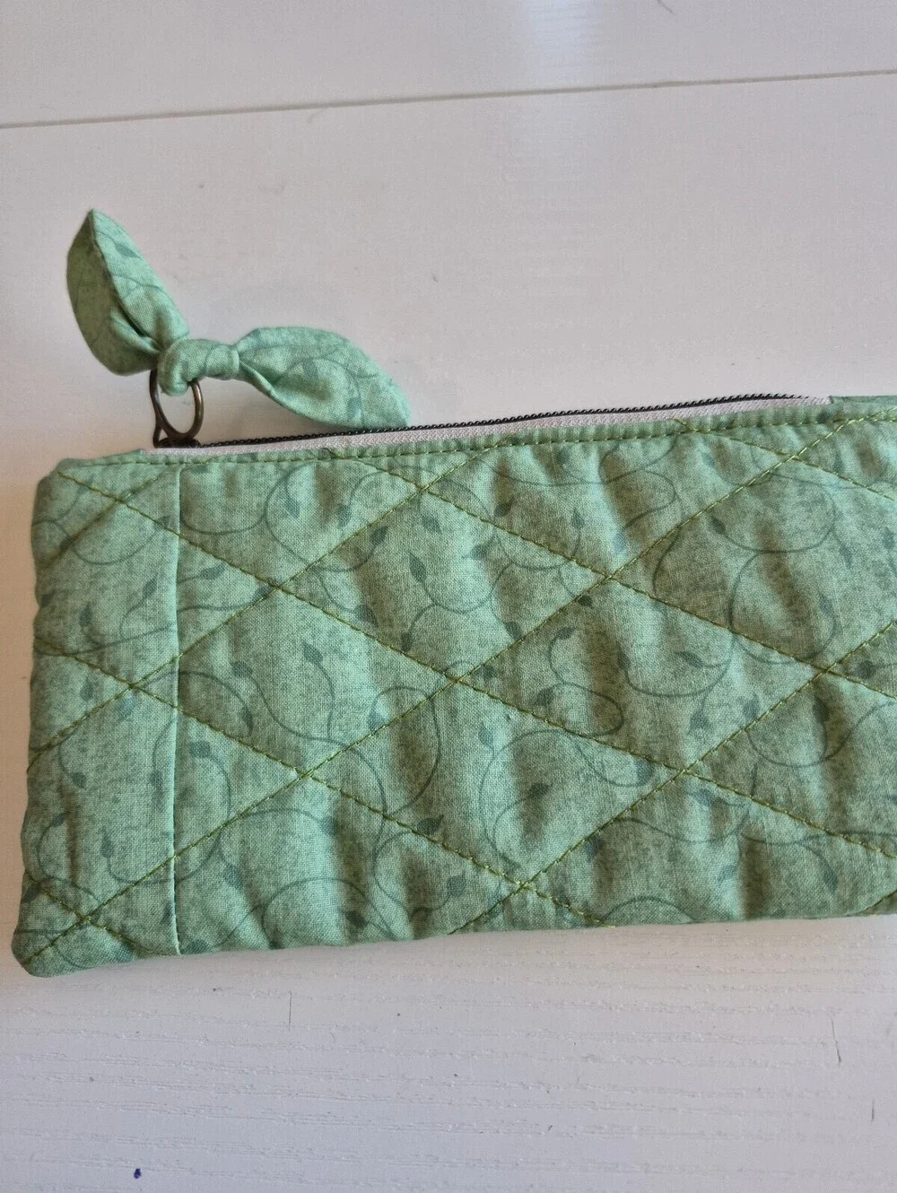 Quilted bow pouch
